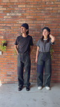 Load and play video in Gallery viewer, Latre upcycled deadstock overdyed US laundry bag trousers - Black/Blue
