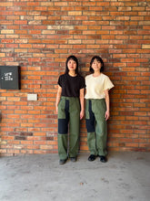 Load and play video in Gallery viewer, Latre upcycled deadstock overdyed Patchwork US laundry bag trousers
